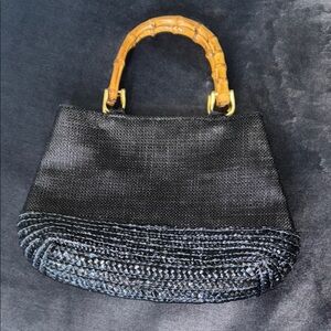 Elegant Black Woven Handbag with Bamboo Handle